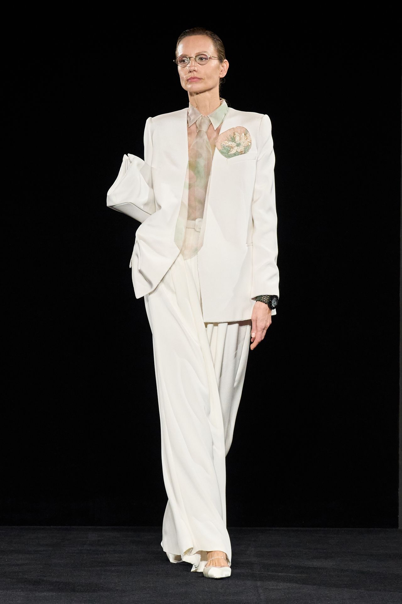 Image may contain Clothing Formal Wear Suit Blazer Coat Jacket Tuxedo Adult and Person